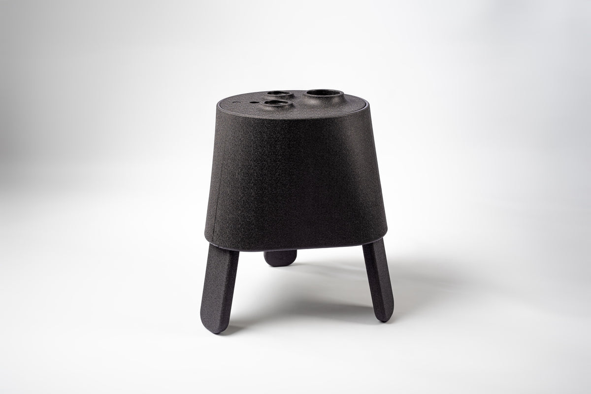 AYTO Black – black multifunctional side table made of EPP on a white background
