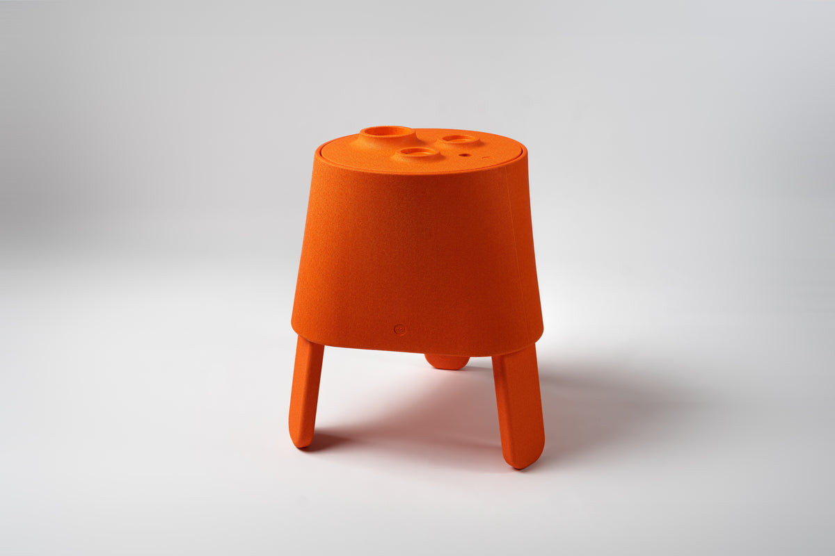 AYTO Orange – orange multifunctional side table made of EPP on a white background